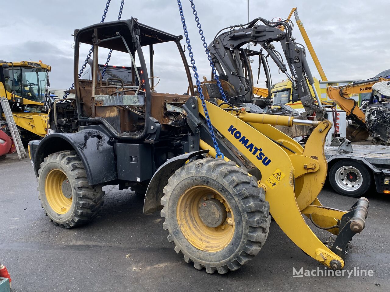 damaged Komatsu WA 100M-7  wheel loader